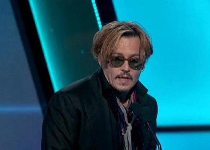 See Johnny Depp Presents The Hollywood Documentary Award In A Strange Way