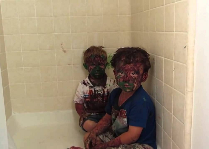 Watch These Kids Play With Paint And Get It All Over Their Faces