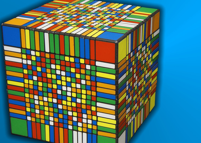 Watch This Guy As He Solves The World's Largest Rubik's Cube Under 8 Hours